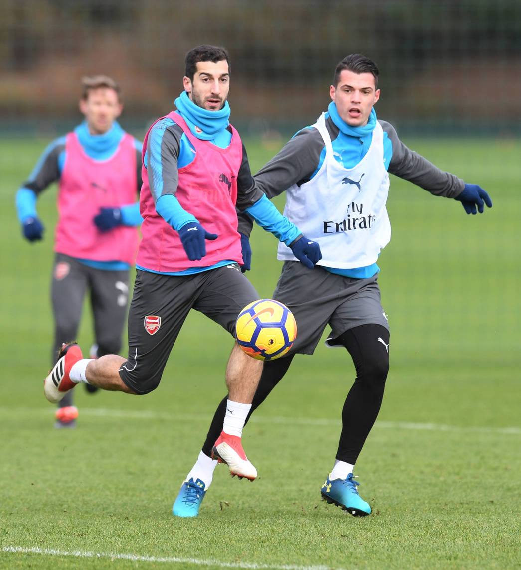 ST ALBANS, ENGLAND - FEBRUARY 02:  (L-R) Henrikh Mkhitaryan and Granit Xhaka of Arsenal during a training session at London Colney on February 2, 2018 in St Albans, England.  (Photo by Stuart MacFarlane/Arsenal FC via Getty Images) *** Local Caption *** Henrikh Mkhitaryan;Granit Xhaka