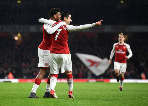 LONDON, ENGLAND - FEBRUARY 03: Henrikh Mkhitaryan of Arsenal and Alex Iwobi of Arsenal celebrate their sides first goal during the Premier League m...