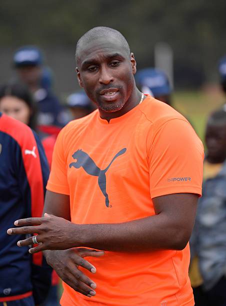 sol campbell orange tshirt
