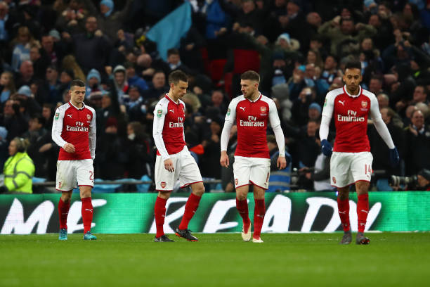 LONDON, ENGLAND - FEBRUARY 25: Granit Xhaka, Laurent Koscielny, Aaron Ramsey and Pierre-Emerick Aubameyang of Arsenal look dejected during the Carabao Cup Final between Arsenal and Manchester City at Wembley Stadium on February 25, 2018 in London, England. (Photo by Julian Finney/Getty Images)