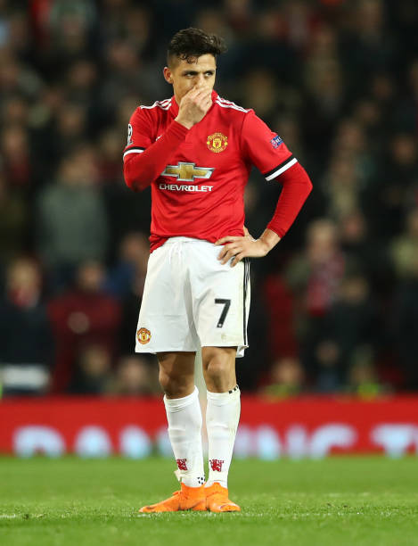 MANCHESTER, ENGLAND - MARCH 13: Alexis Sanchez of Manchester United looks despondent during the UEFA Champions League Round of 16 Second Leg match ...