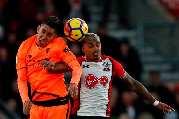 Liverpool eye strong 6ft midfielder 'flattered' by Arsenal interest, Gunners need him 5 Liverpool's Brazilian midfielder Roberto Firmino (L) jumps against Southampton's Gabonese midfielder Mario Lemina (R) during the English Premier League football match between Southampton and Liverpool at St Mary's Stadium in Southampton, southern England on February 11, 2018. / AFP PHOTO / Adrian DENNIS
