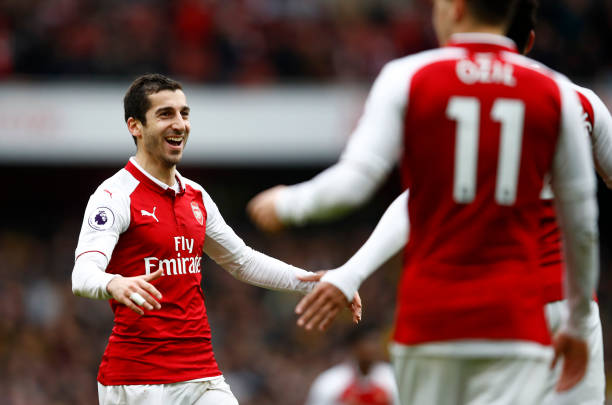 LONDON, ENGLAND - MARCH 11: Henrikh Mkhitaryan of Arsenal celebrates scoring the 3rd Arsenal goal during the Premier League match between Arsenal a...