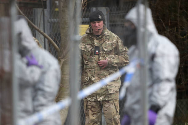 GILLINGHAM, ENGLAND - MARCH 14: Forensic teams work at an address in Gillingham, Dorset as they remove a recovery truck used following the Salisbury nerve agent attack, on March 14, 2018 in Gillingham, England. After a deadline passed for Russia to confirm it's involvement in the attempted murder of Sergei Skripal and his daughter Yulia in Salisbury, British Prime Minister Theresa May is expected to announce a series of measures against Russia. Mr Skripal who was granted refuge in the UK following a 'spy swap' between the US and Russia in 2010 and his daughter remain critically ill after being attacked with a nerve agent. (Photo by Christopher Furlong/Getty Images)
