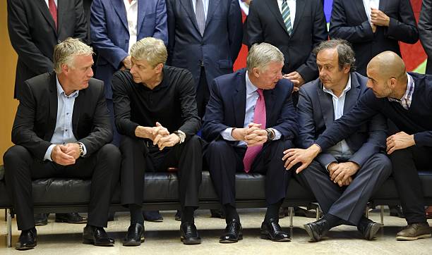 (L to R) Olympique Marseille's head coach Didier Deschamps, Arsenal's manager Arsene Wenger, Manchester United's manager Alex Ferguson, UEFA president Michel Platini and Barcelona's coach Josep Guardiola are seen during a family picture on August 31, 2011 in Nyon during the 13e Elite football Club Coaches Forum. Europe's leading club coaches are invited to discuss the latest trends in club football and express their views on the major issues affecting top club football. AFP PHOTO / FABRICE COFFRINI 