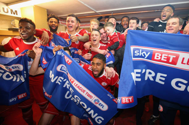 ACCRINGTON, ENGLAND - APRIL 17: The players of Accrington Stanley celebrate gaining promotion after the Sky Bet League Two match between Accrington Stanley and Yeovil Town at The Crown Ground on April 17, 2018 in Accrington, England. (Photo by Alex Livesey/Getty Images)