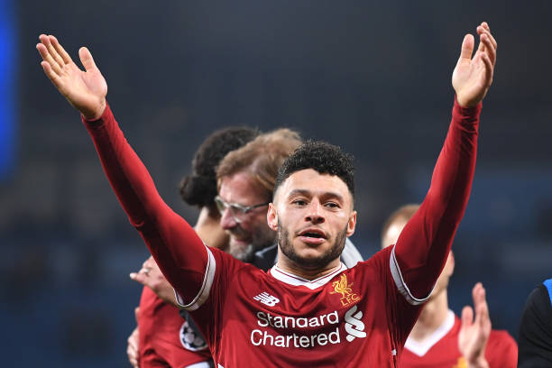 MANCHESTER, ENGLAND - APRIL 10: Alex Oxlade-Chamberlain of Liverpool shows appreciation to the fans after the UEFA Champions League Quarter Final S...