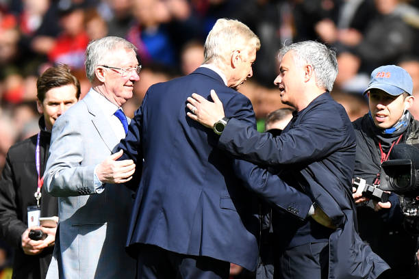 Arsenal's French manager Arsene Wenger (C) is greeted by Manchester United's former manager Alex Ferguson (L) and Manchester United's Portuguese ma...