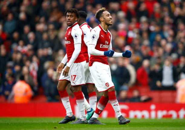 LONDON, ENGLAND - APRIL 08: Pierre-Emerick Aubameyang of Arsenal celebrates with team mates after scoring his sides first goal during the Premier L...