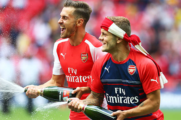 Mikel Arteta opens door for Jack Wilshere training return 7 LONDON, ENGLAND - AUGUST 10: Aaron Ramsey and Jack Wilshere of Arsenal celebrate their win during the FA Community Shield match between Manchester City and Arsenal at Wembley Stadium on August 10, 2014 in London, England. (Photo by Clive Mason/Getty Images)