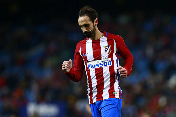 MADRID, SPAIN - DECEMBER 20: Juan Francisco Torres alias Juanfran of Atletico de Madrid celebrates scoring their third goal during the Copa del Rey...