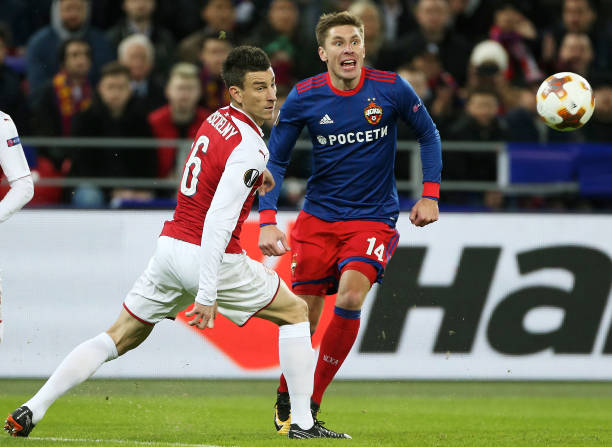 MOSCOW, RUSSIA - APRIL 12: Kirill Nababkin of PFC CSKA Moskva vies for the ball with Laurent Koscielny of Arsenal FC during the UEFA Europa League quarter final leg two match between PFC CSKA Moskva and Arsenal FC at CSKA Arena stadium on April 12, 2018 in Moscow, Russia. (Photo by Oleg Nikishin/Getty Images)