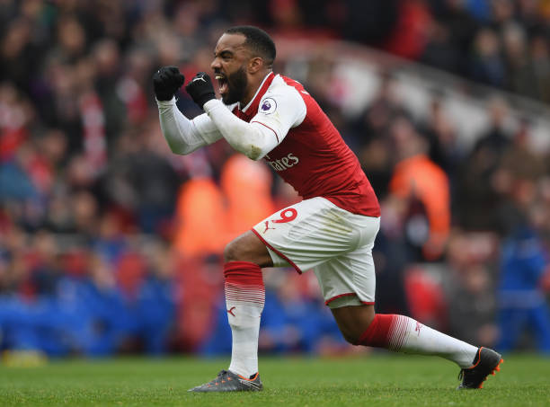 LONDON, ENGLAND - APRIL 01: Alexandre Lacazette of Arsenal celebrates after scoring his sides third goal during the Premier League match between Ar...