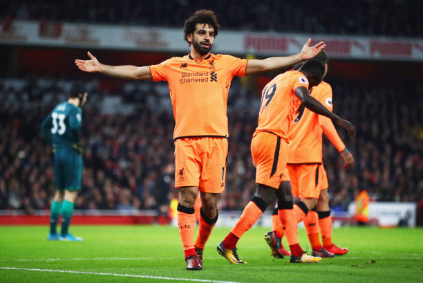 LONDON, ENGLAND - DECEMBER 22: Mohamed Salah of Liverpool celebrates as he scores their second goal during the Premier League match between Arsenal...