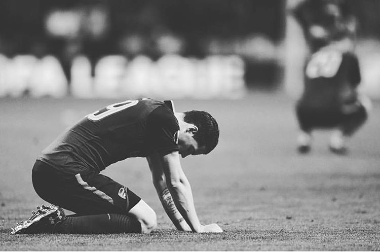 MADRID, SPAIN - MAY 03: Laurent Koscielny of Arsenal lies injured during the UEFA Europa League Semi Final second leg match between Atletico Madrid...