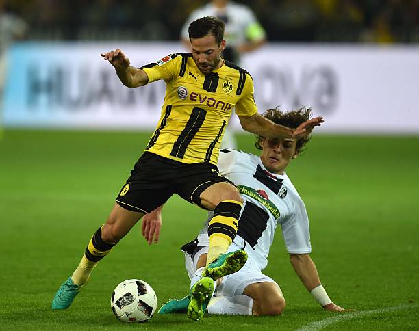 Arsenal officials jet to Turkey, Soyuncu confirms interest but delivers concerning update 2 Dortmund's midfielder Gonzalo Castro and Freiburg´s Turkish defender Caglar Soyuncu vie for the ball during the German first division Bundesliga football match between Borussia Dortmund and SC Freiburg in Dortmund, western Germany, on September 23, 2016. / AFP / PATRIK STOLLARZ