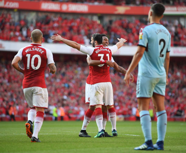 He showed strength and determination: Arsenal player ratings as they bury Burnley 3 LONDON, ENGLAND - MAY 06: Sead Kolasinac of Arsenal celebrates with Pierre-Emerick Aubameyang of Arsenal after he scores his sides second goal during the Premier League match between Arsenal and Burnley at Emirates Stadium on May 6, 2018 in London, England. (Photo by Mike Hewitt/Getty Images)