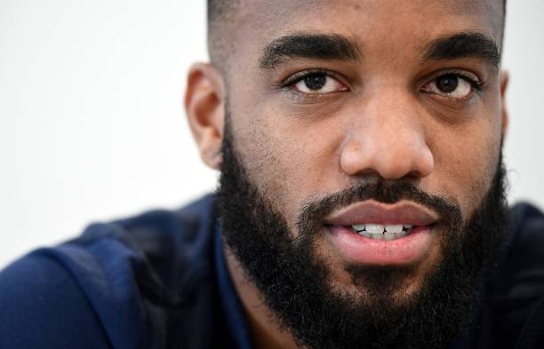 France's forward Alexandre Lacazette looks on during a press conference in Clairefontaine en Yvelines on August 28, 2017, as part of the team's pre...