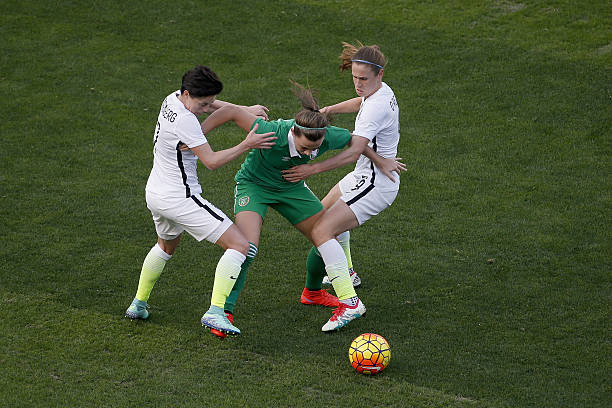 12 Arsenal players get international call 5 SAN DIEGO, CA - JANUARY 23: Katie McCabe #15 of Ireland is defended by Meghan Klingenberg #7 (L) and Heather O'Reilly #9 (R) of the United States as the United States won 5-0 at Qualcomm Stadium on January 23, 2016 in San Diego, California. (Photo by Todd Warshaw/Getty Images)