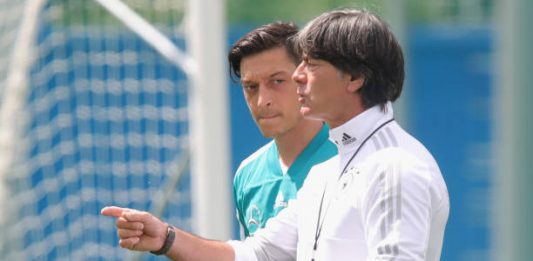 MOSCOW, RUSSIA - JUNE 13: Joachim Loew, head coach of Germany talks to his palyer Mesut Oezil during the Germany training session ahead of the 2018 FIFA World Cup at CSKA Sports Base on June 13, 2018 in Moscow, Russia. (Photo by Alexander Hassenstein/Getty Images)