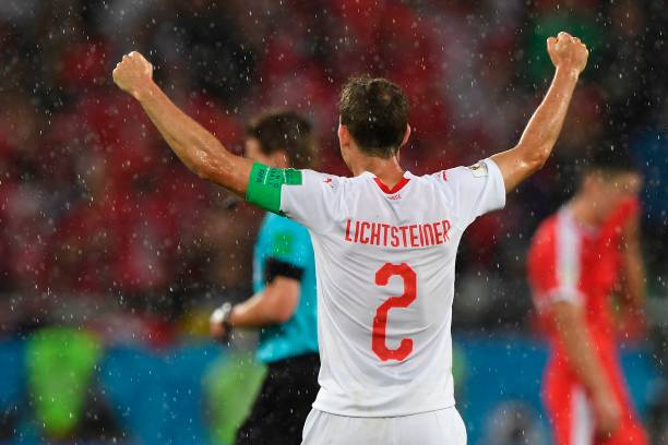 Switzerland's defender Stephan Lichtsteiner reacts after winning their Russia 2018 World Cup Group E football match between Serbia and Switzerland ...
