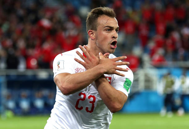 FIFA start proceedings against Granit Xhaka 3 KALININGRAD, RUSSIA - JUNE 22: Xherdan Shaqiri of Switzerland celebrates after scoring his team's second goal during the 2018 FIFA World Cup Russia group E match between Serbia and Switzerland at Kaliningrad Stadium on June 22, 2018 in Kaliningrad, Russia. (Photo by Clive Rose/Getty Images)