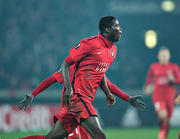 FC Midtjylland's Nigerian forward Paul Onuachu celebrates scoring their second goal during the UEFA Europa League Round of 32 football match betwee...
