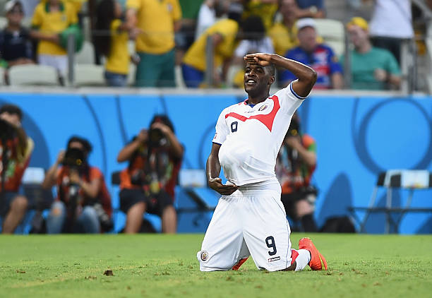 FORTALEZA, BRAZIL - JUNE 14: Joel Campbell of Costa Rica celebrates scoring his team's first goal with the ball under his jersey during the 2014 FI...