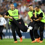MOSCOW, RUSSIA - JULY 15: Stewards dragging a pitch during the 2018 FIFA World Cup Final between France and Croatia at Luzhniki Stadium on July 15, 2018 in Moscow, Russia. (Photo by Matthias Hangst / Getty Images)