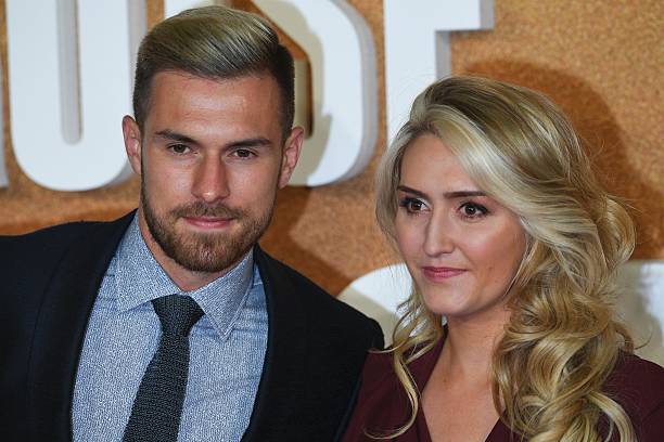 Arsenal's Welsh football player Aaron Ramsey (L) poses with his wife Colleen Rowland upon arrival to attend the European premiere of the film 'Jack...