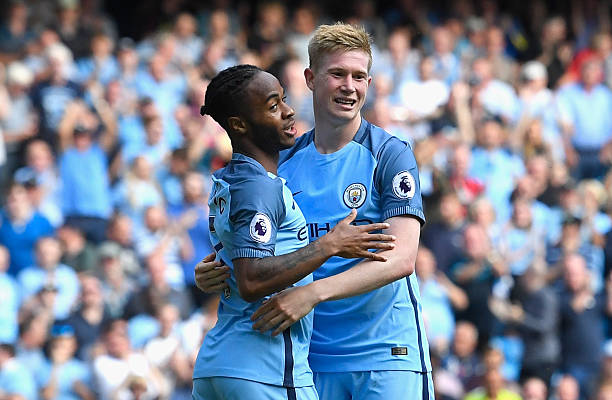 Arsenal dropped the ball at the wrong time: Why they have no money 3 MANCHESTER, ENGLAND - SEPTEMBER 17: Raheem Sterling of Manchester City (L) celebrates scoring his sides third goal with Kevin De Bruyne of Manchester City (R) during the Premier League match between Manchester City and AFC Bournemouth at the Etihad Stadium on September 17, 2016 in Manchester, England. (Photo by Stu Forster/Getty Images)