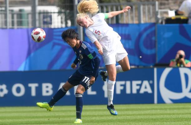 England's defender Grace Fisk (R) vies with Japan's forward Saori Takarada during the Women's U20 World Cup semi-final football match between England and Japan in La Rabine stadium in Vannes, western France on August 20, 2018. (Photo by FRED TANNEAU / AFP) 