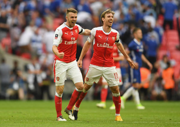 Arsenal identify Nicolas Tagliafico as ball-winning Nacho Monreal replacement 2 LONDON, ENGLAND - MAY 27: Aaron Ramsey and Nacho Monreal of Arsenal celebrate victory after the Emirates FA Cup Final between Arsenal and Chelsea at Wembley Stadium on May 27, 2017 in London, England. (Photo by Laurence Griffiths/Getty Images)