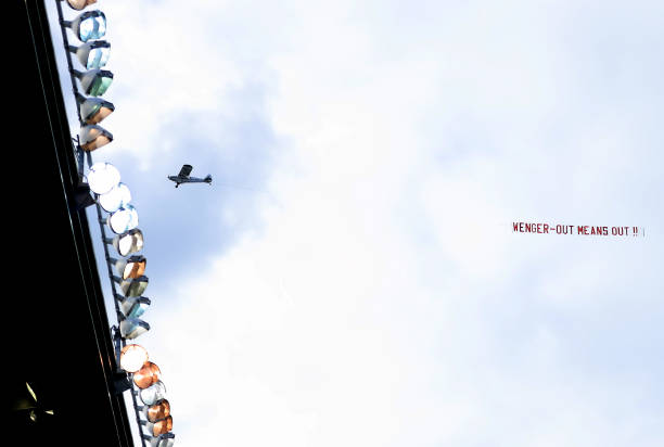 STOKE ON TRENT, ENGLAND - MAY 13: A plane flys over the ground with a banner during the Premier League match between Stoke City and Arsenal at Bet365 Stadium on May 13, 2017 in Stoke on Trent, England. (Photo by Richard Heathcote/Getty Images)