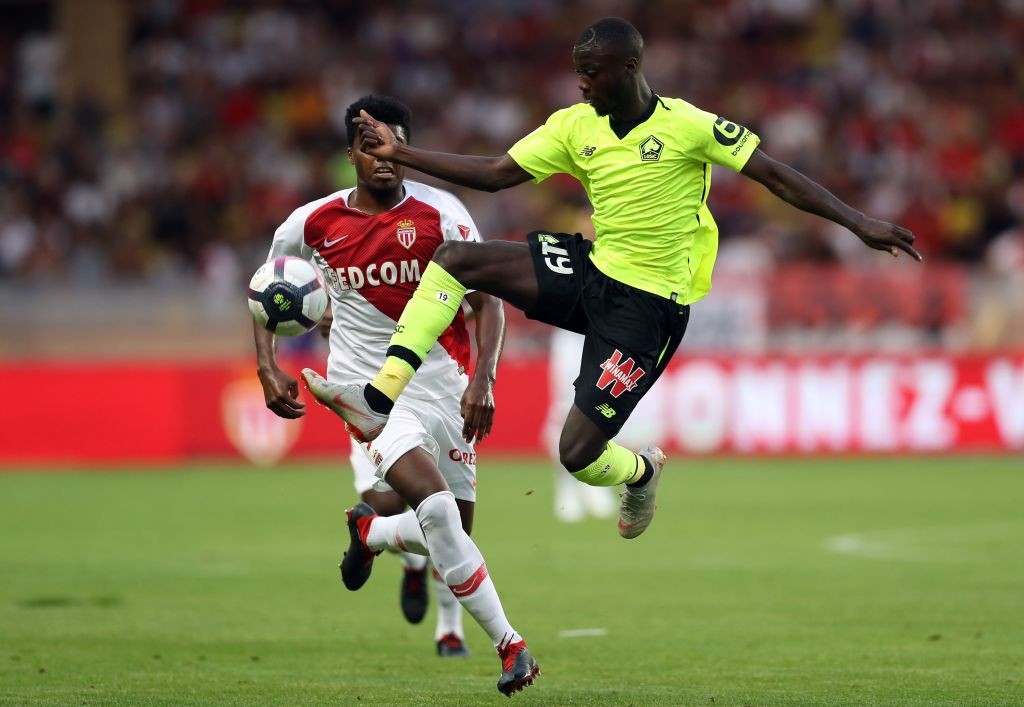 Monaco's Brazilian defender Jemerson (L) fights for the ball with Lille's Ivorian forward Nicolas Pepe (R)during the French L1 football match betwe...