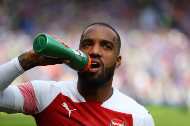 CARDIFF, WALES - SEPTEMBER 02: Alexandre Lacazette of Arsenal has a drink before the Premier League match between Cardiff City and Arsenal FC at Ca...
