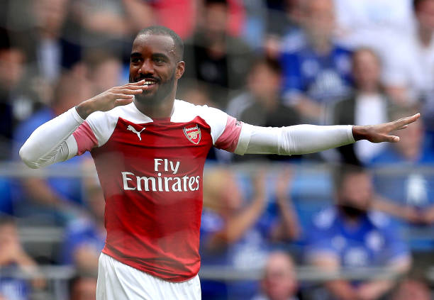 CARDIFF, WALES - SEPTEMBER 02: Alexandre Lacazette of Arsenal celebrates as he scores his team's third goal during the Premier League match between...