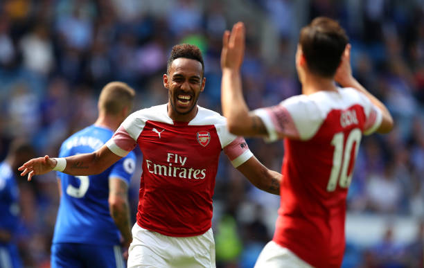 CARDIFF, WALES - SEPTEMBER 02: Pierre-Emerick Aubameyang of Arsenal celebrates after scoring his team's second goal with Mesut Ozil during the Prem...
