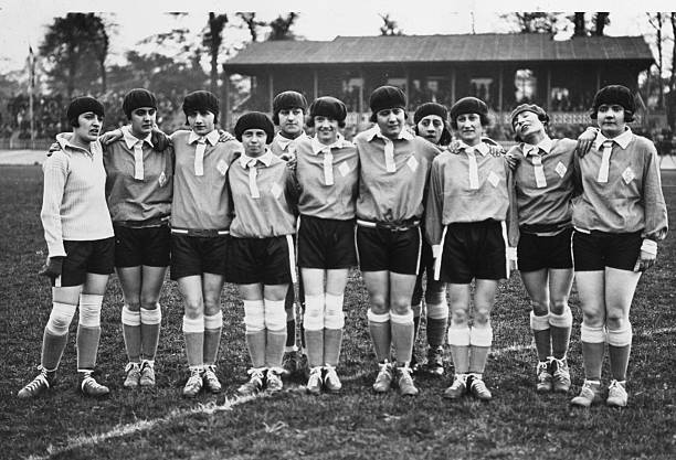 12th May 1925: The French women's football team, complete with berets, line up before the England vs France Women's International Football match in...