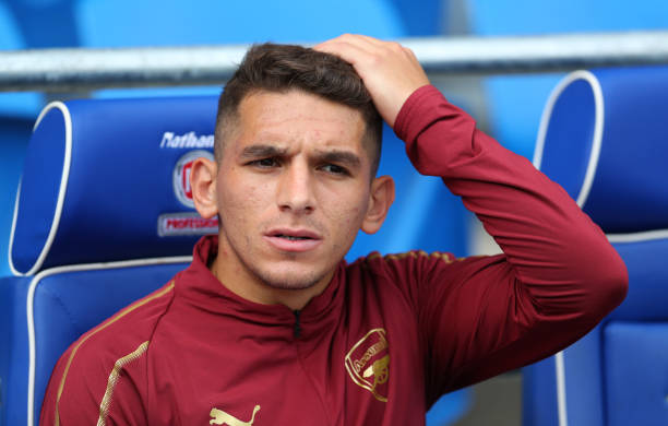 CARDIFF, WALES - SEPTEMBER 02: Lucas Torreira of Arsenal sits on the bench before the Premier League match between Cardiff City and Arsenal FC at C...