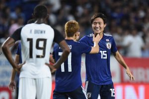 SUITA, JAPAN - SEPTEMBER 11: Kento Misao and Takuma Asano of Japan celebrate during the international friendly match between Japan and Costa Rica at Suita City Football Stadium on September 11, 2018 in Suita, Osaka, Japan. (Photo by Matt Roberts/Getty Images)