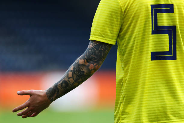 DOETINCHEM, NETHERLANDS - SEPTEMBER 11: A detailed view of the arm tattoo on David Bates of Scotland during the UEFA European Under-21 Championship...
