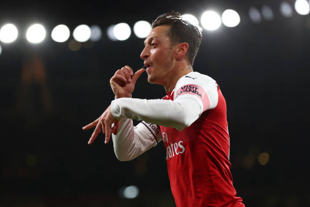 Ray Parlour explains Unai Emery’ problem with Mesut Ozil 3 LONDON, ENGLAND - OCTOBER 22: Mesut Ozil of Arsenal celebrates after he scores his sides first goal during the Premier League match between Arsenal FC and Leicester City at Emirates Stadium on October 22, 2018 in London, United Kingdom. (Photo by Clive Rose/Getty Images)