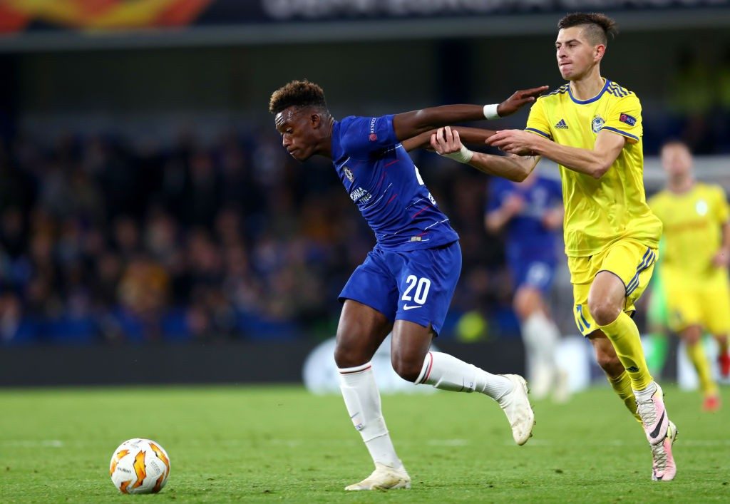 LONDON, ENGLAND - OCTOBER 25: Callum Hudson-Odoi of Chelsea holds off Aleksei Rios of FC BATE during the UEFA Europa League Group L match between Chelsea and FC BATE Borisov at Stamford Bridge on October 25, 2018 in London, United Kingdom. (Photo by Clive Rose/Getty Images)