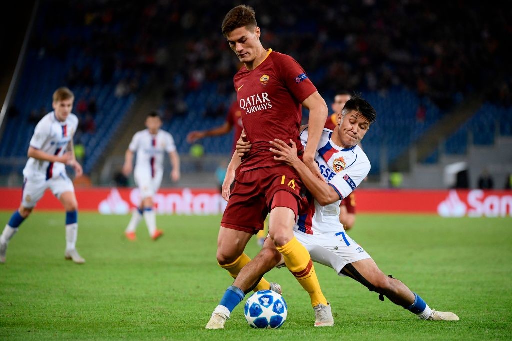 AS Roma Czech forward Patrik Schick (c) holds off CSKA Moscow's Russian midfielder Ilzat Akhmetov during the UEFA Champions League group G stage fo...