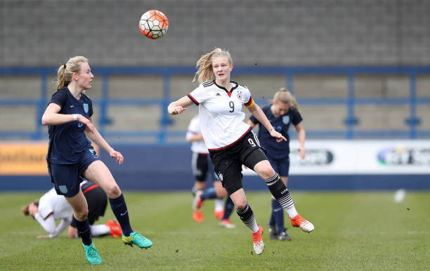 TELFORD, ENGLAND - MARCH 27: Anna-Lena Stolze of Germany and Shannon Cooke of England in action during the England v Germany U17 Girl's Elite Round match on March 27, 2017 in Telford, England. (Photo by Lynne Cameron/Bongarts/Getty Images)
