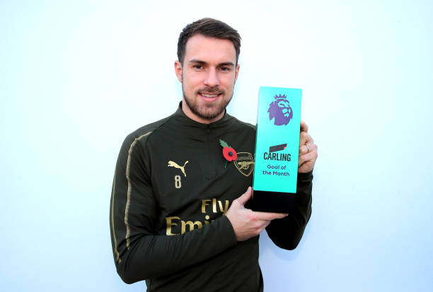 ST ALBANS, ENGLAND - NOVEMBER 09: Arron Ramsey is presented with his Carling Goal of the Month Award for October at London Colney on November 9, 20...