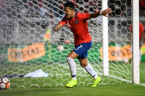 Chile's player Alexis Sanchez reacts after failing to score a penalty kick against Costa Rica, during a friendly football match, at El Teniente sta...