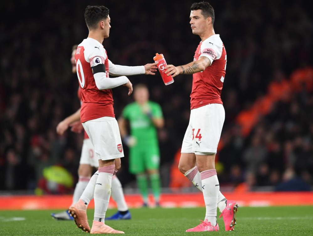 Granit Xhaka and Mesut Ozil v Liverpool [via AP]