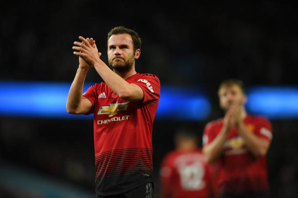 MANCHESTER, ENGLAND - NOVEMBER 11: Juan Mata of Manchester United acknowledges the fans after the Premier League match between Manchester City and ...